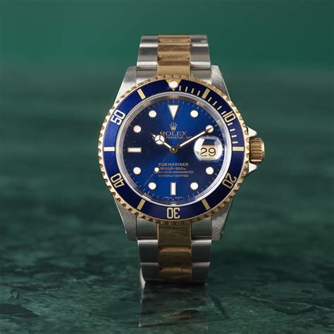 rolex oyster perpetual date submariner 1000ft 300m gold|Rolex Submariner Date black dial.